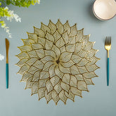 Gold Floral Cutout Table Mat with Intricate Petal Design