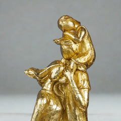 Golden Family Embrace Sculpture
