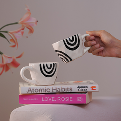 White Ceramic Mug with Hand-Painted Black Arch Design