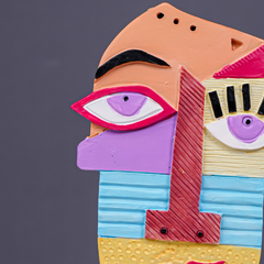 Multicolor Abstract Face Sculpture with Textured Face
