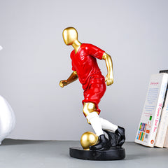 Soccer Player Sculpture in Red Uniform