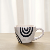 White Ceramic Mug with Hand-Painted Black Arch Design