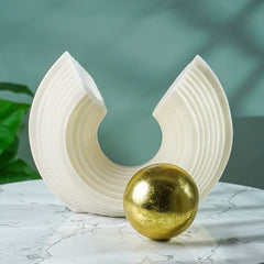 White Tiered Arch Sculpture with Gold Sphere