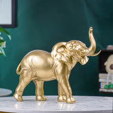 Golden Elephant Figurine with Raised Trunk