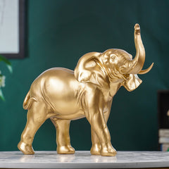 Golden Elephant Figurine with Raised Trunk