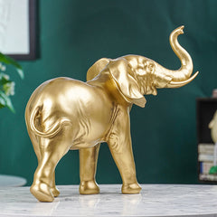 Golden Elephant Figurine with Raised Trunk