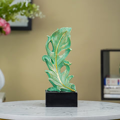 Green Leaf-Inspired Decorative Sculpture with Golden Accents