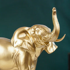 Golden Elephant Figurine with Raised Trunk