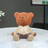 Brown Textured Teddy Bear Figurine in Yellow Shirt