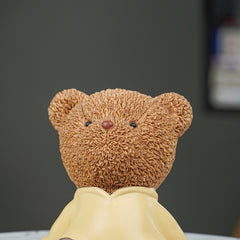 Brown Teddy Bear Figurine in Yellow Hoodie