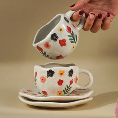 Hand Painted Ceramic Cup and Saucer Set with Floral Pattern