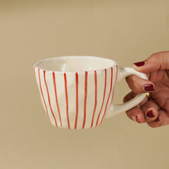 White Ceramic Cup with Hand-Painted Red Stripes