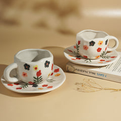 Hand Painted Ceramic Cup and Saucer Set with Floral Pattern