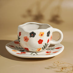 Hand Painted Ceramic Cup and Saucer Set with Floral Pattern