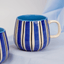 Blue and White Striped Ceramic Mug - The Golden Theory