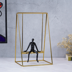 Black Figure on Gold Swing