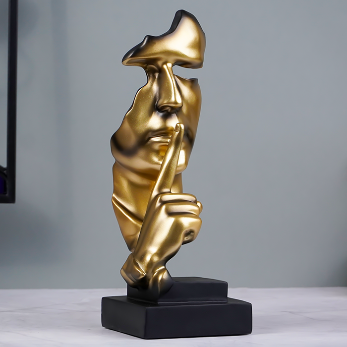 Gold Face Sculpture with Shhh Gesture