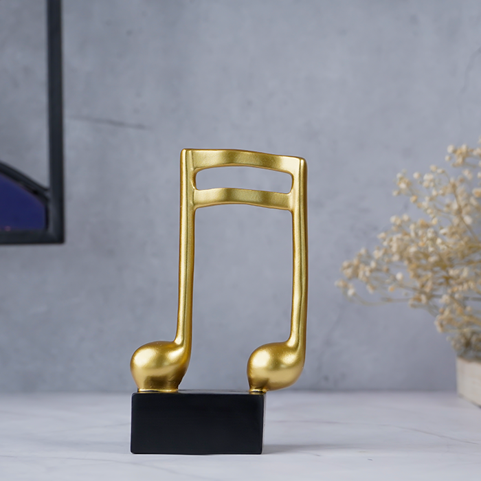 Gold Musical Note Figurine on Black Base