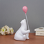 White Polar Bear Figurine with Pink Balloon