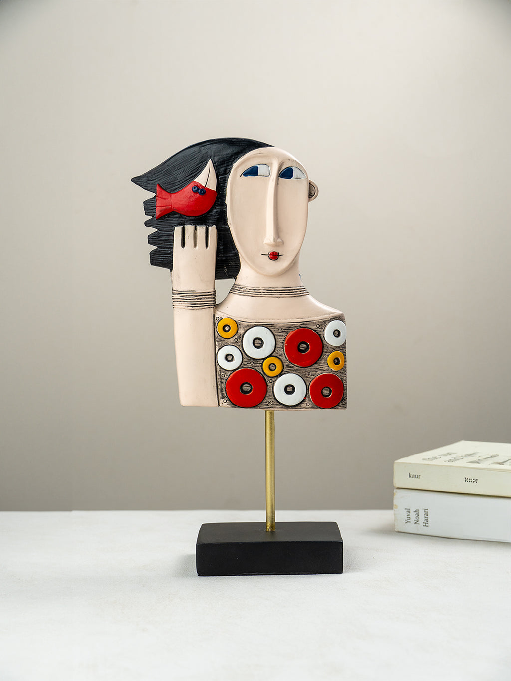 Colorful Abstract Face Sculpture with Red Bird