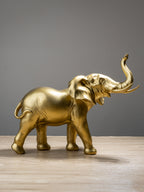 Golden Elephant Figurine with Raised Trunk