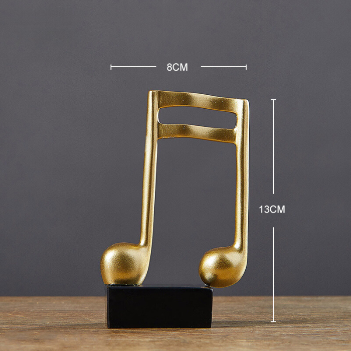 Gold Musical Note Figurine on Black Base