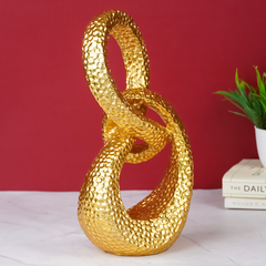 Gold Interlocking Loops Sculpture - Modern Textured Art