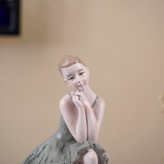 Ballerina Figurine Sitting on Sphere