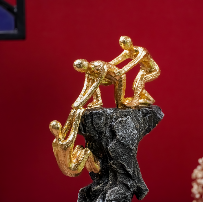 Gold-Clad Teamwork Sculpture on Granite Base