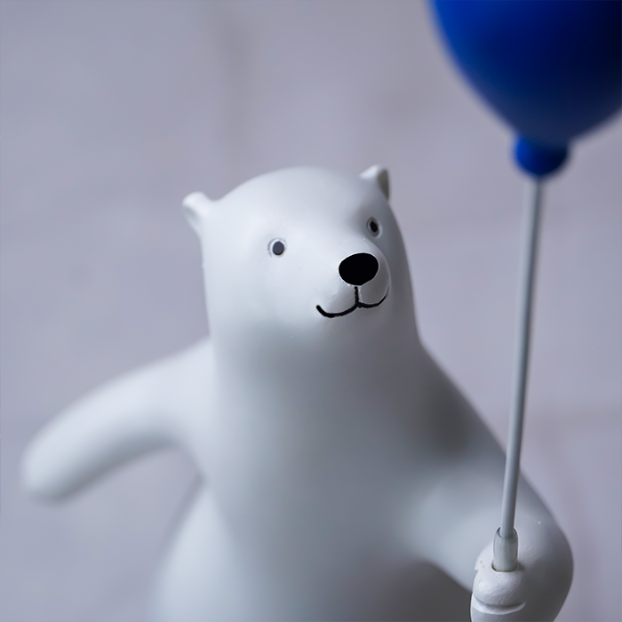 White Bear Figurine with Blue Balloon