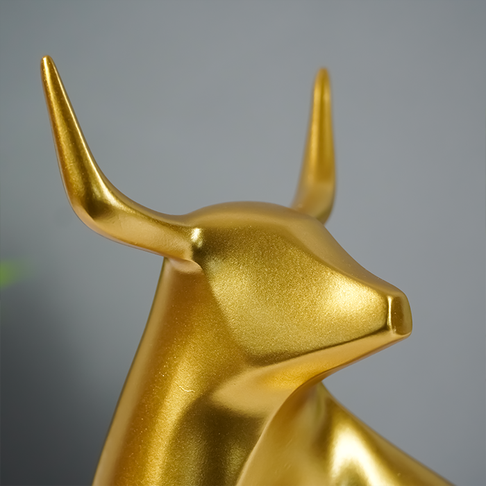 Gold Bull Sculpture with Geometric Cutouts