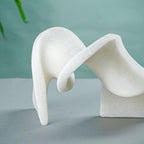 White Abstract Resin Sculpture with Fluid Folded Design