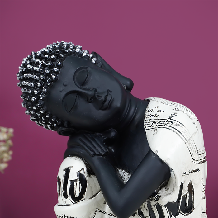 Serene Black and White Sleeping Buddha Statue