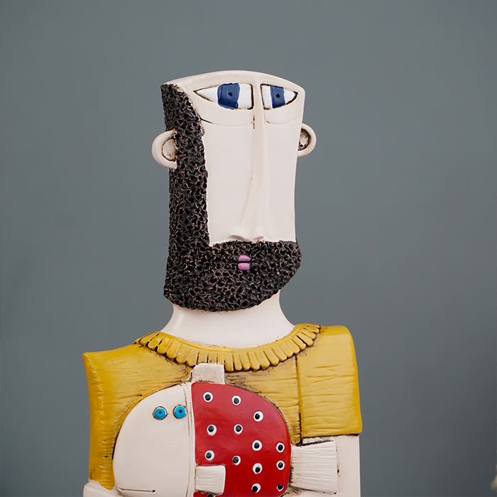 Abstract Bearded Man Sculpture with Red Polka Dot Fish