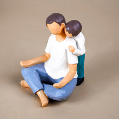 Father and Child Figurine in Neutral Tones