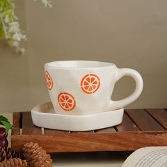 Cream Ceramic Cup with Orange Slice Motif