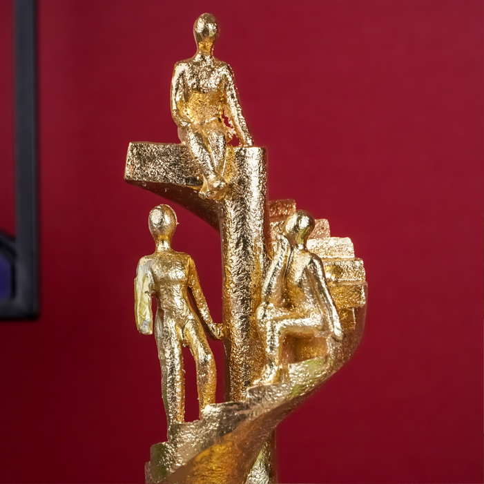 Gold Figures on Spiral Staircase Sculpture