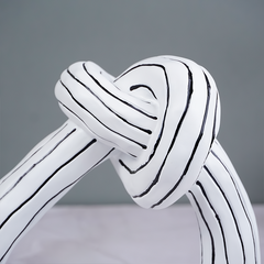 White and Black Striped Knot Sculpture