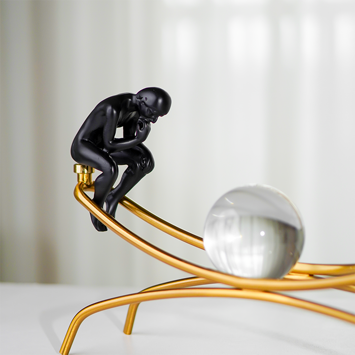 Modern Black Thinker Sculptures on Gold Arch with Crystal Sphere