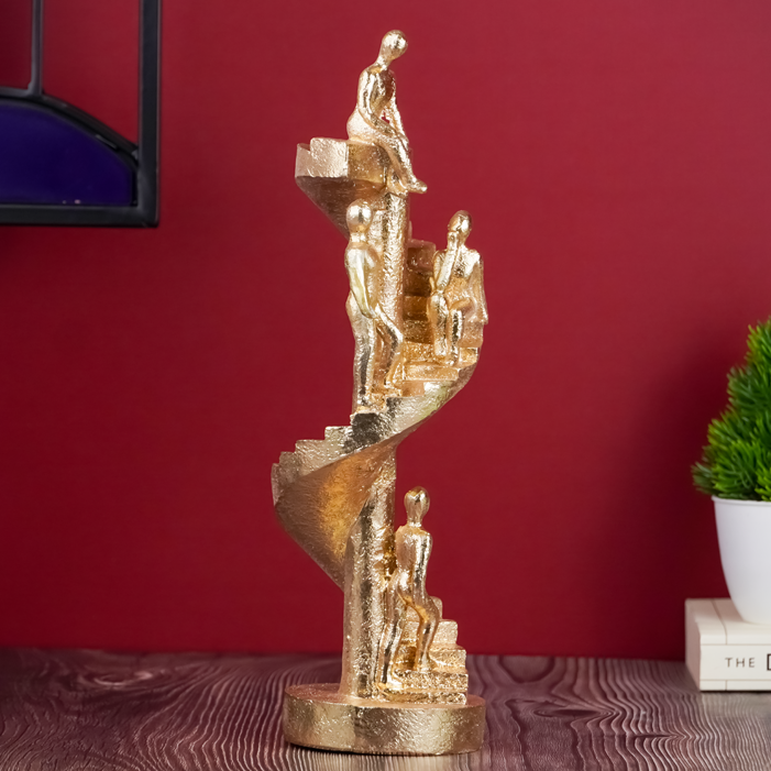 Gold Figures on Spiral Staircase Sculpture