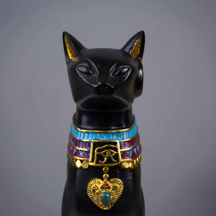 Black Egyptian Cat Statue with Golden Jewelry and Colorful Collar