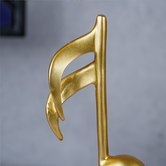 Gold Musical Note Artifact