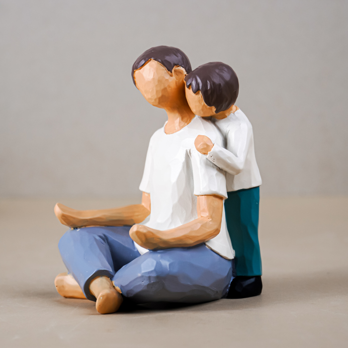 Father and Child Figurine in Neutral Tones