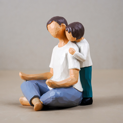 Father and Child Figurine in Neutral Tones