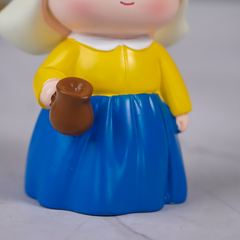 Yellow and Blue Dutch Girl Figurine with White Bonnet