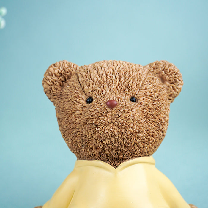 Brown Teddy Bear Figurine in Yellow Hoodie