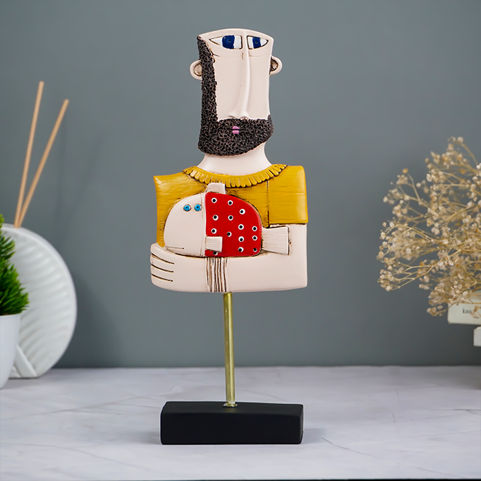 Abstract Bearded Man Sculpture with Red Polka Dot Fish