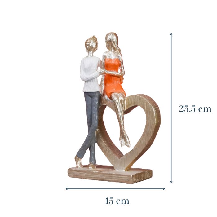 Romantic Couple with Heart Sculpture