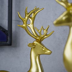 Gold Reindeer Statues