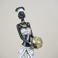 African Lady Holding Gold Pot Figurine